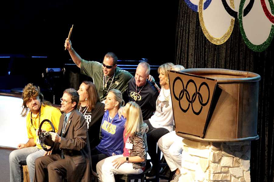 Jeff Bailey, new principal, participates in a skit with Dr. Bret Champion, Superintendent, and other administrators at the district's kick off to begin the school year.